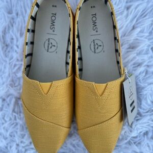 TOMS Women's Yellow Slip-On Shoes